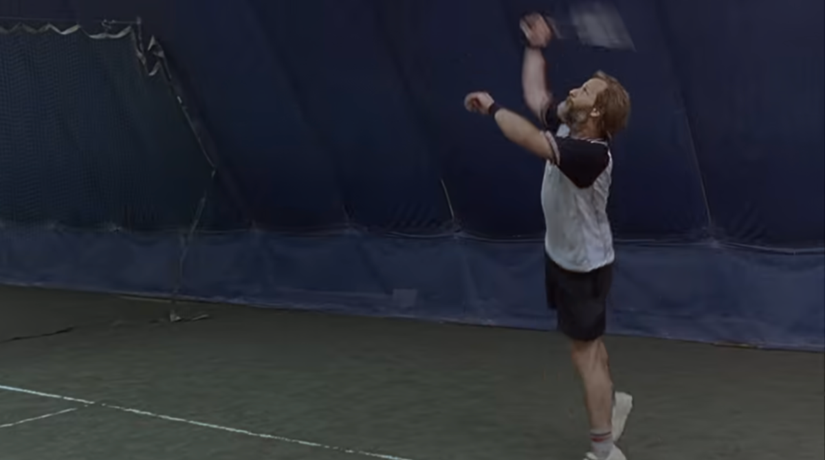 Jeff Daniels serving in tennis in Squid and the Whale